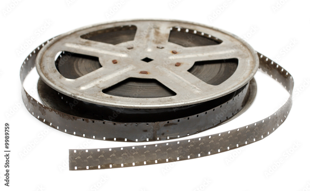 白色隔离金属卷轴上的旧电影胶片