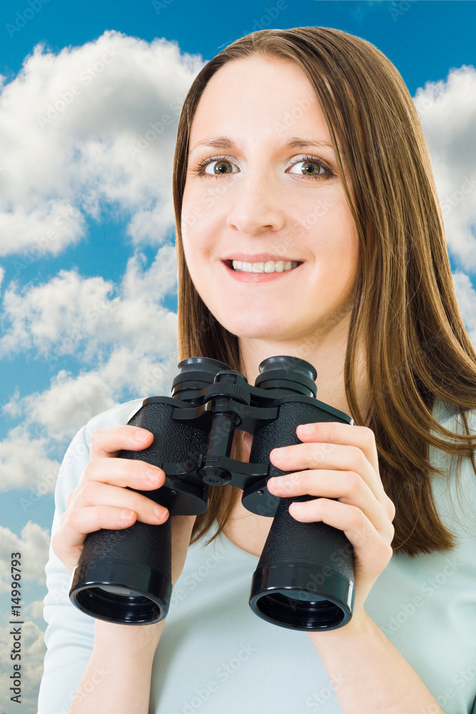 woman with binocular and sky