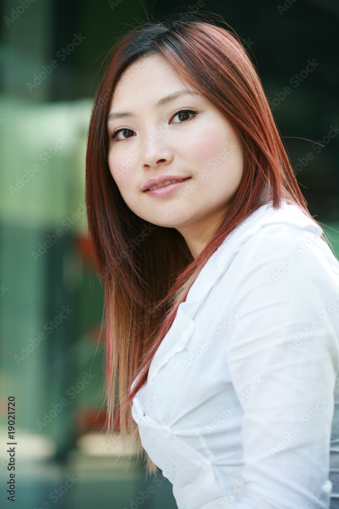 young asian businesswomen outside