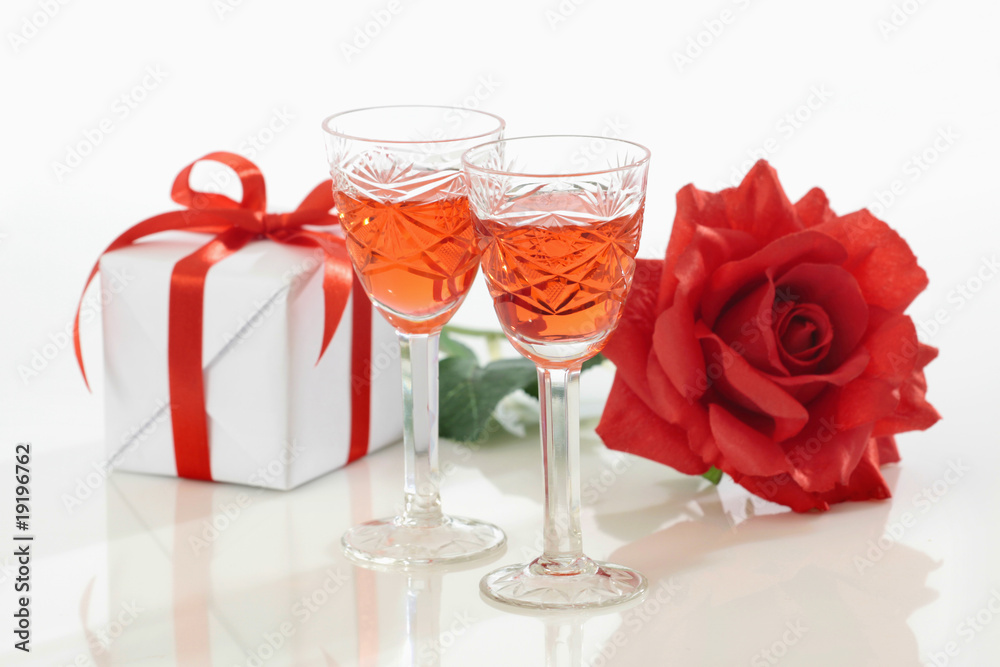 two glasses and rose