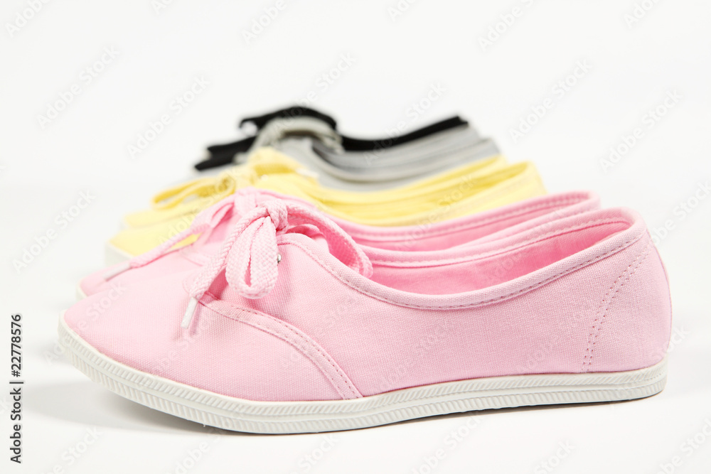 grey ,pink,yellow  and black women shoes with white background