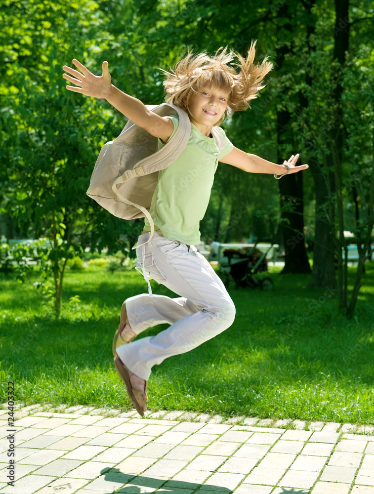 Happy Schoolgirl jumping.Back to School