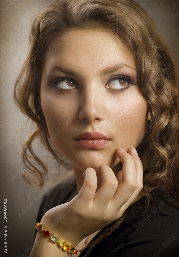 Beauty Portrait with perfect skin and healthy curly hair