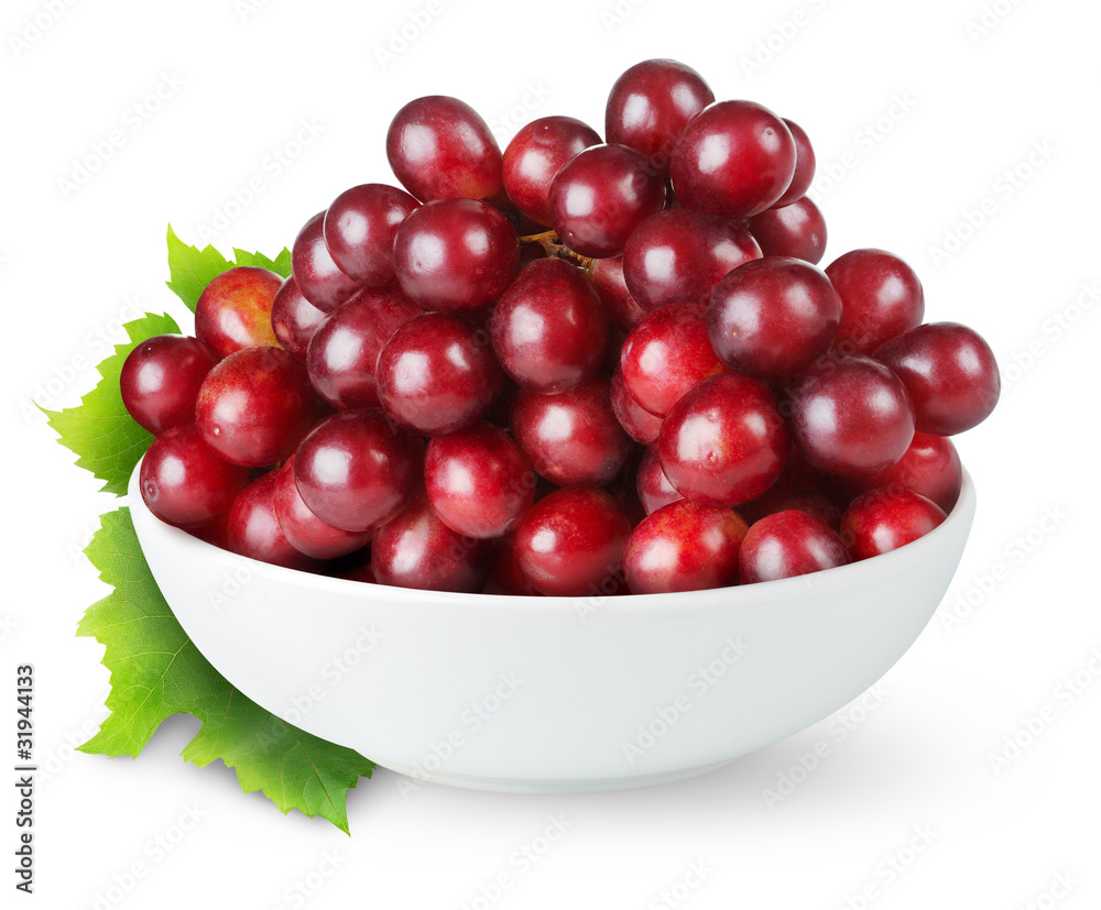 Isolated grapes. Red grape in a bowl isolated on white background