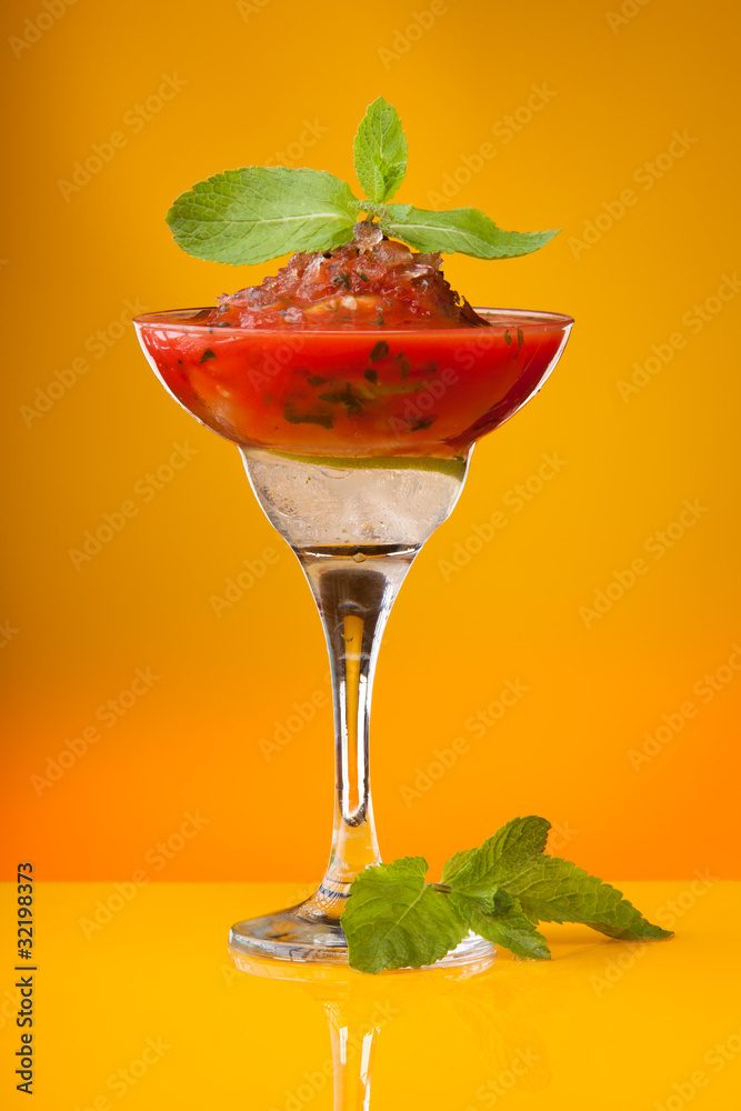Tomato juice with ice and mint
