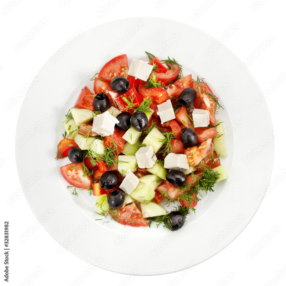 Health Food. Greek salad of seasonal vegetables on a plate