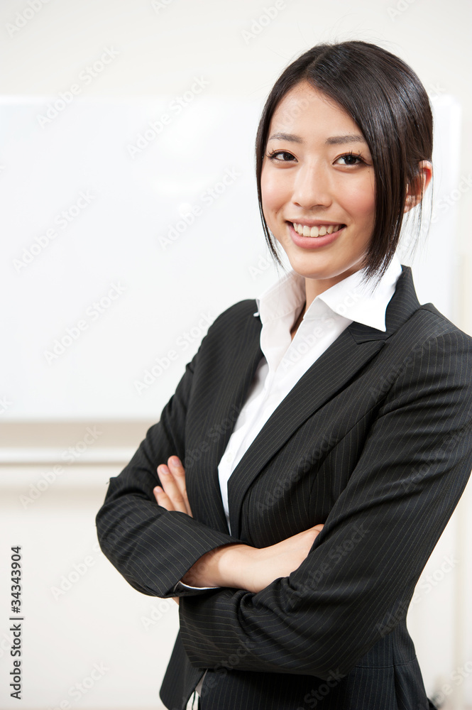 asian businesswoman with blank whiteboard