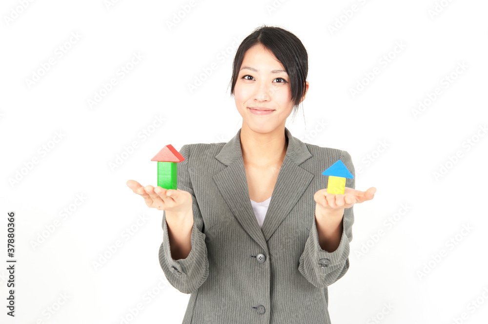 asian businesswoman taking small house