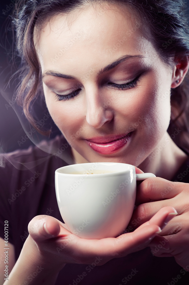 Beauty Girl With Cup of Coffee or Tea
