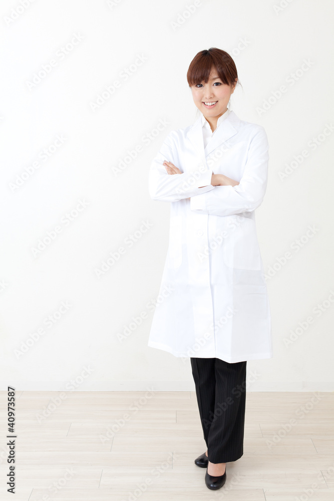 a portrait of asian woman wearing lab coat