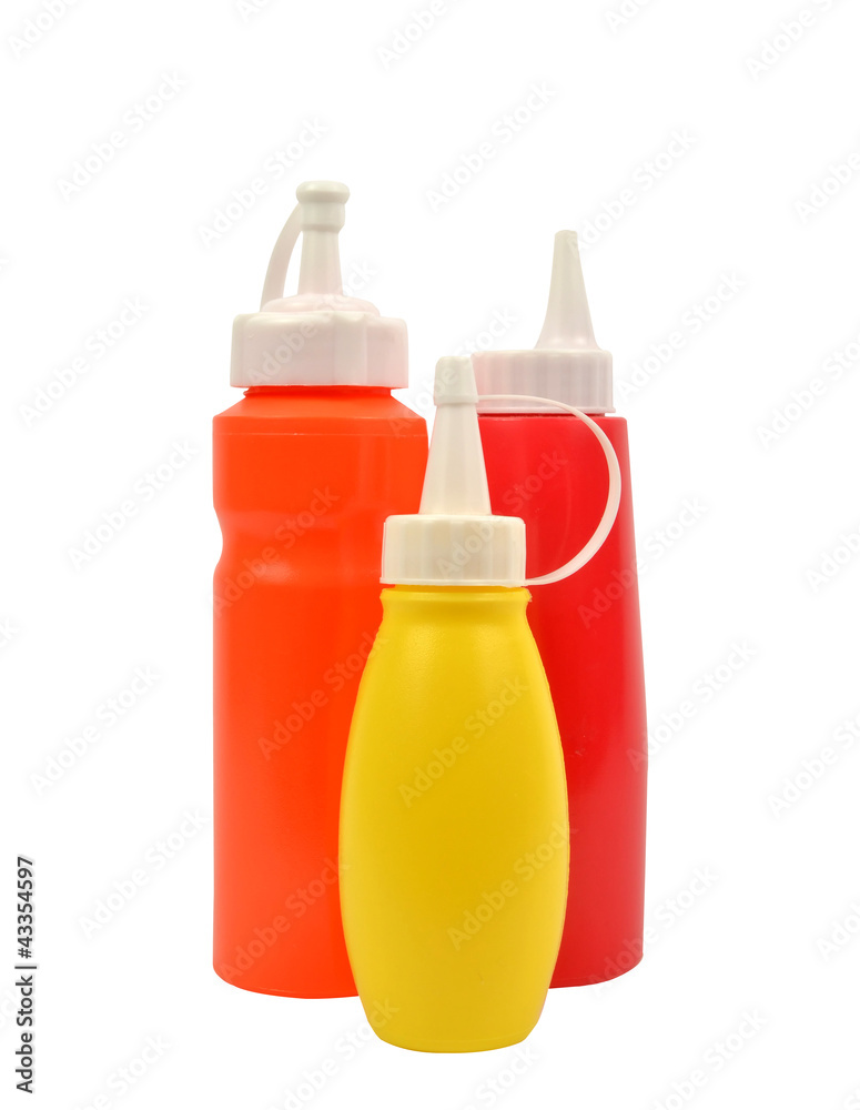 白色隔离的芥末和番茄酱喷射瓶