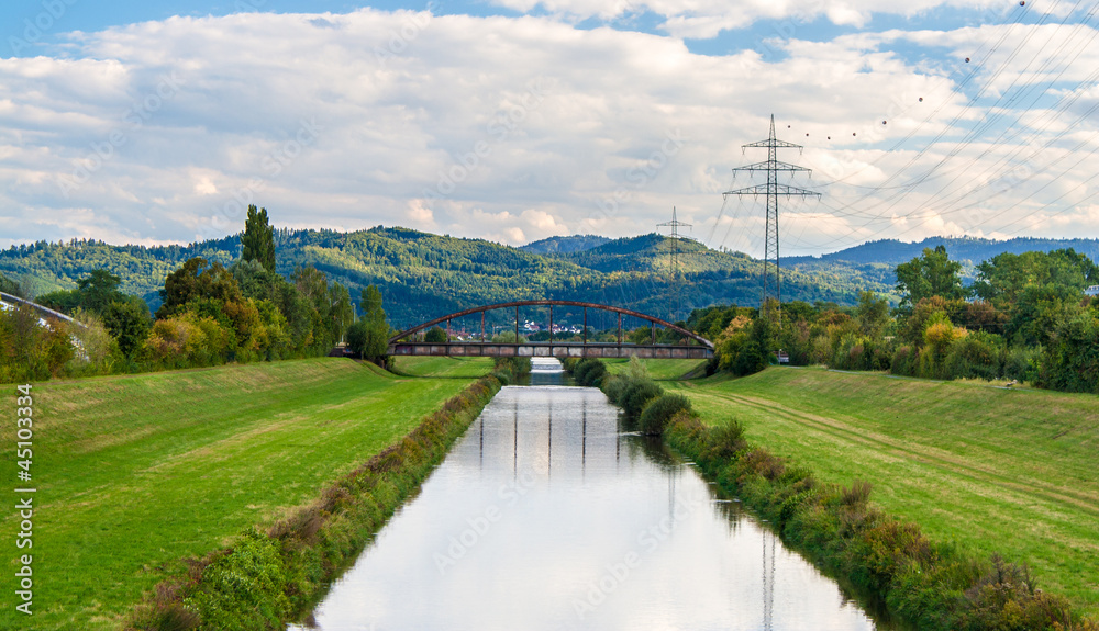 Kinzig river and Black Forest mountains in Offenburg, Germany