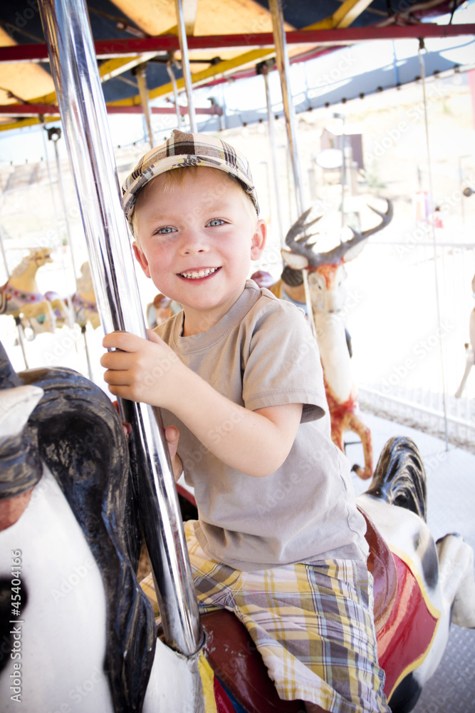 Little Boy on a Carnival Carousel