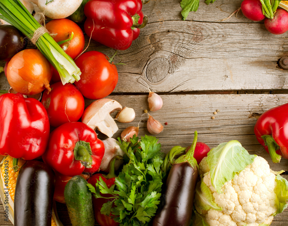 Healthy Organic Vegetables on the Wooden Background