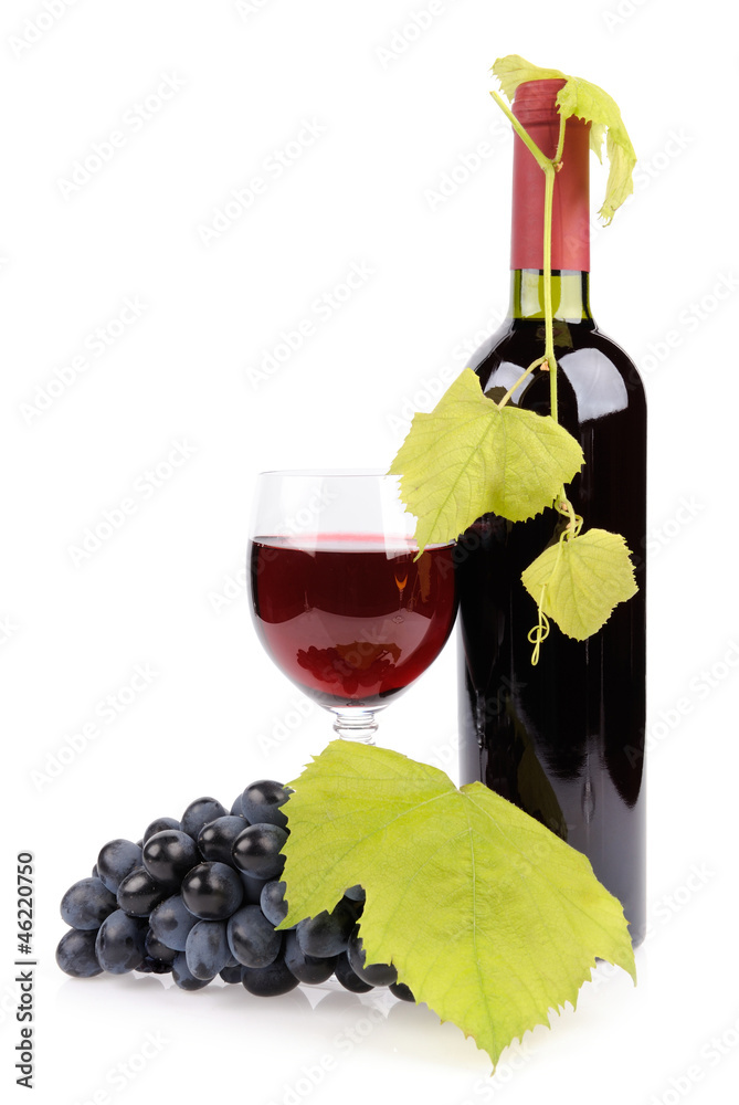 酒瓶、玻璃杯和葡萄