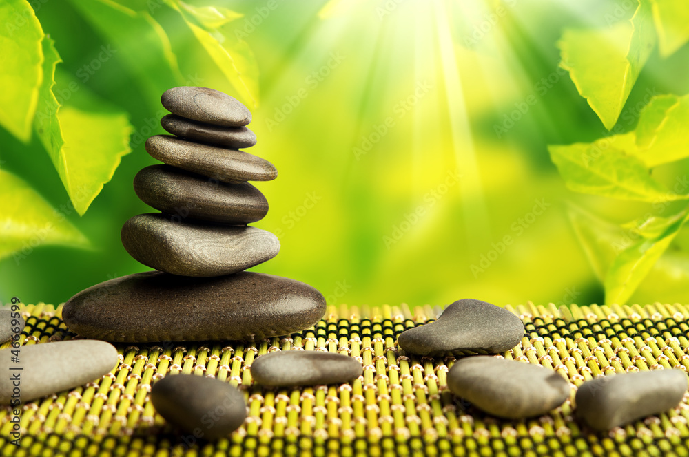 green eco background with spa stones and leaves