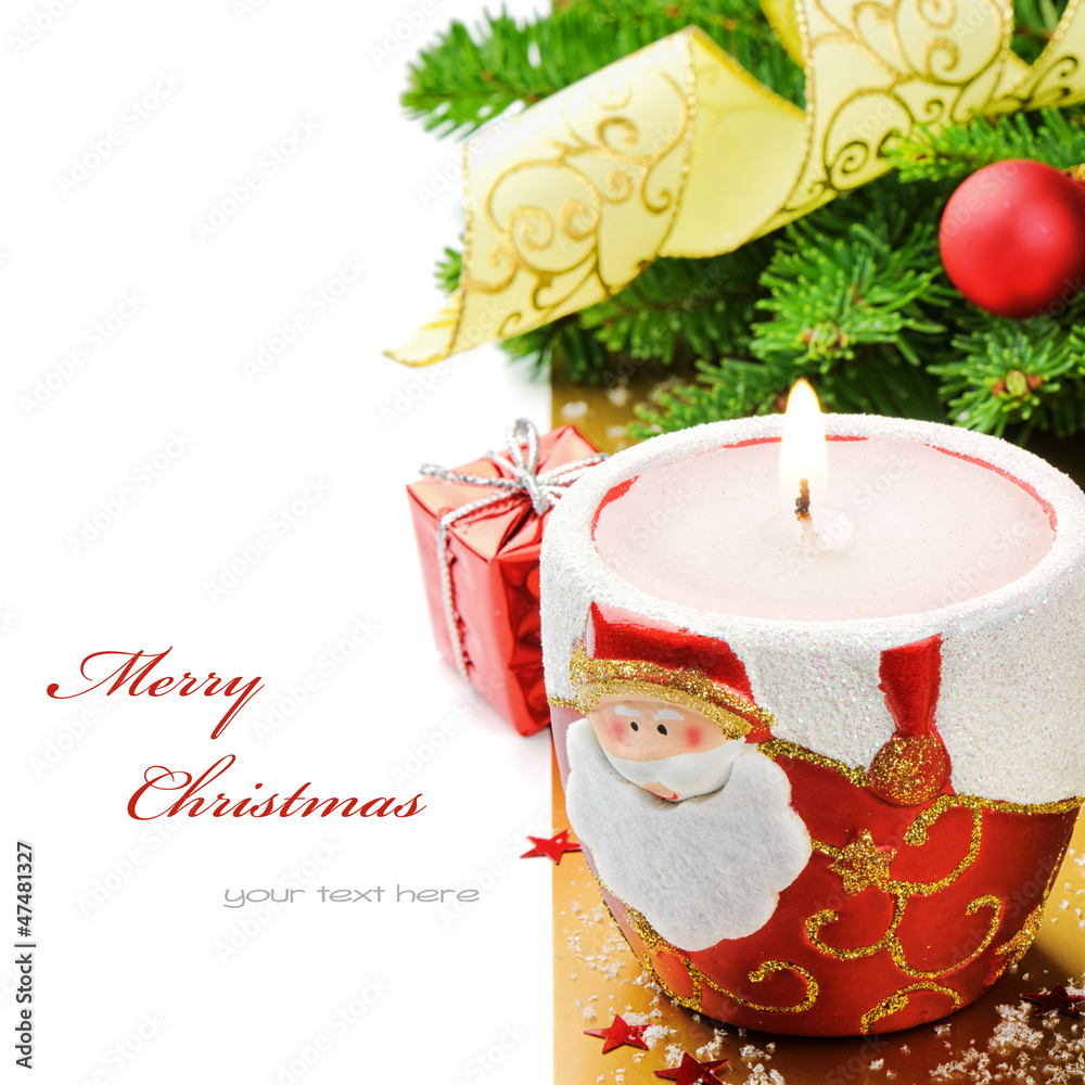 Red Christmas candle on festive background