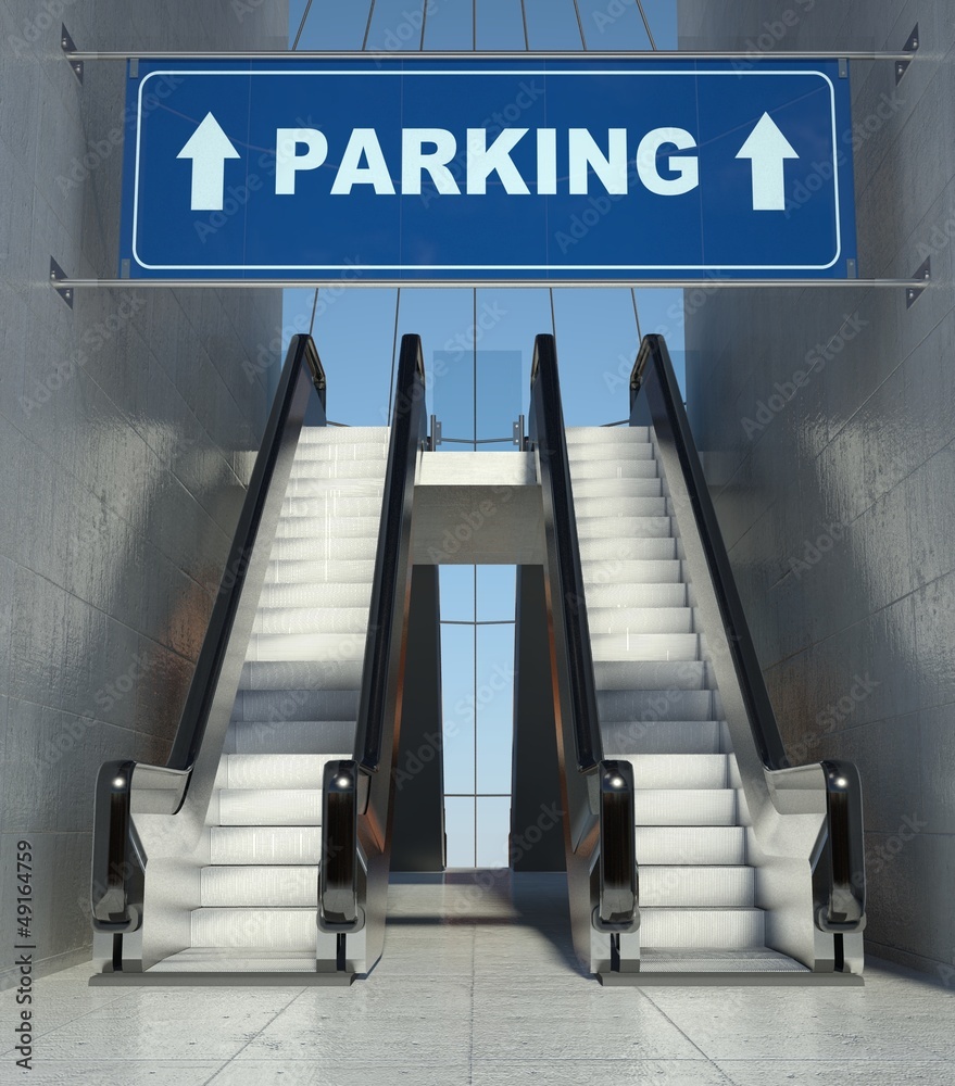 Moving escalator stairs in building, parking sign