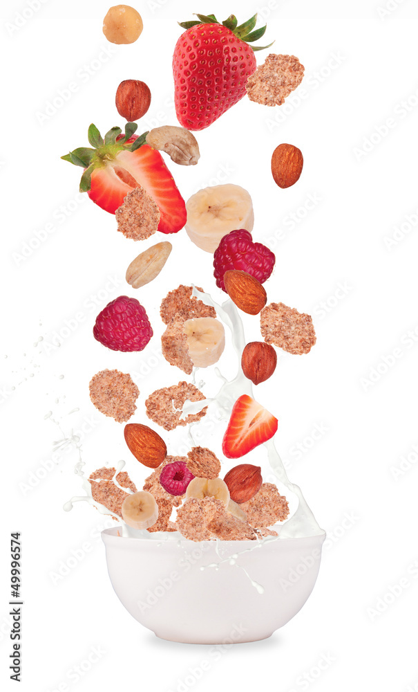 Healthy food and milk with flying cereals and fruit on white
