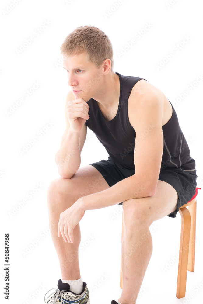 a young sporty man on white background