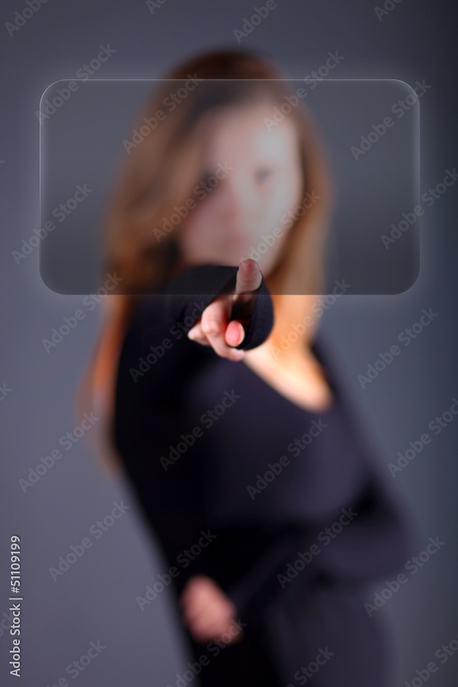 Business woman pushes button on touch screen