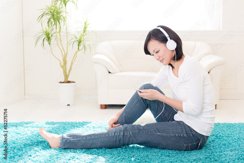 beautiful asian woman listening music