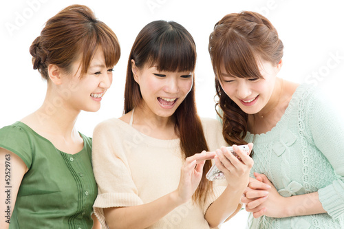 Beautiful young women using a cellular