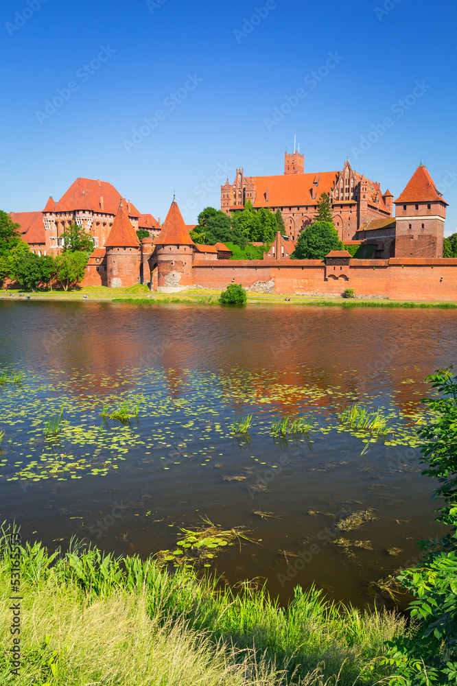 Malbork castle in summer scenery, Poland