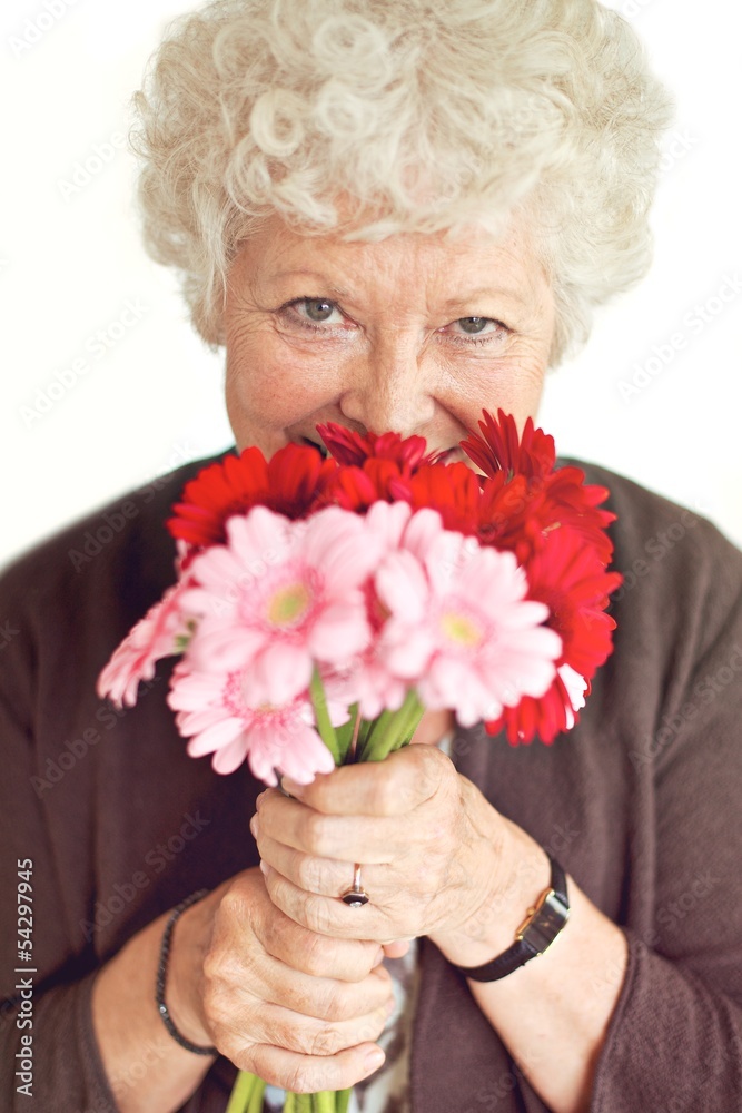 Grandmother Smelling the Flowers