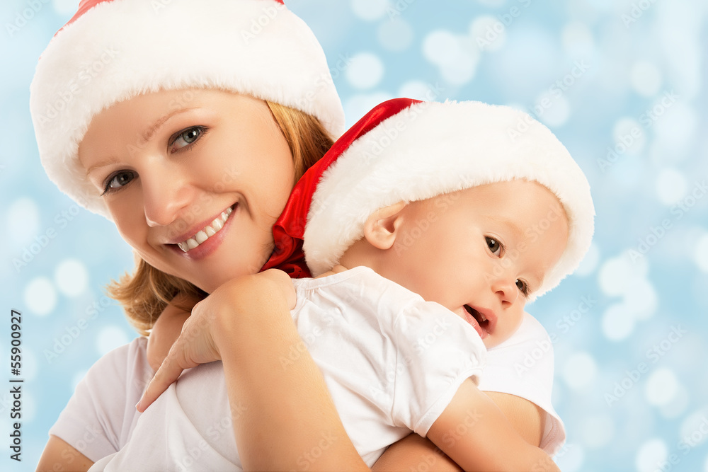 happy family mother and baby in Christmas hats