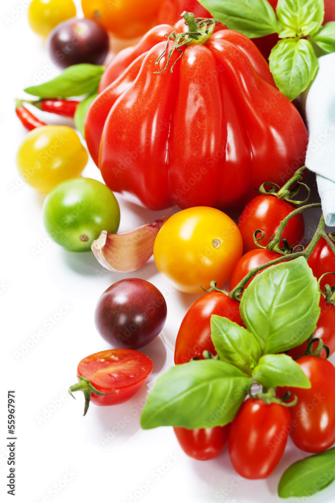 fresh tomatoes and herbs - healthy eating concept
