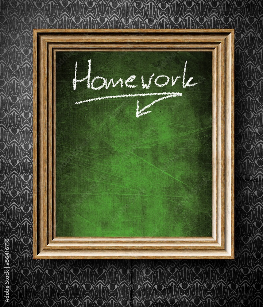 Homework with copy-space chalkboard in old wooden frame