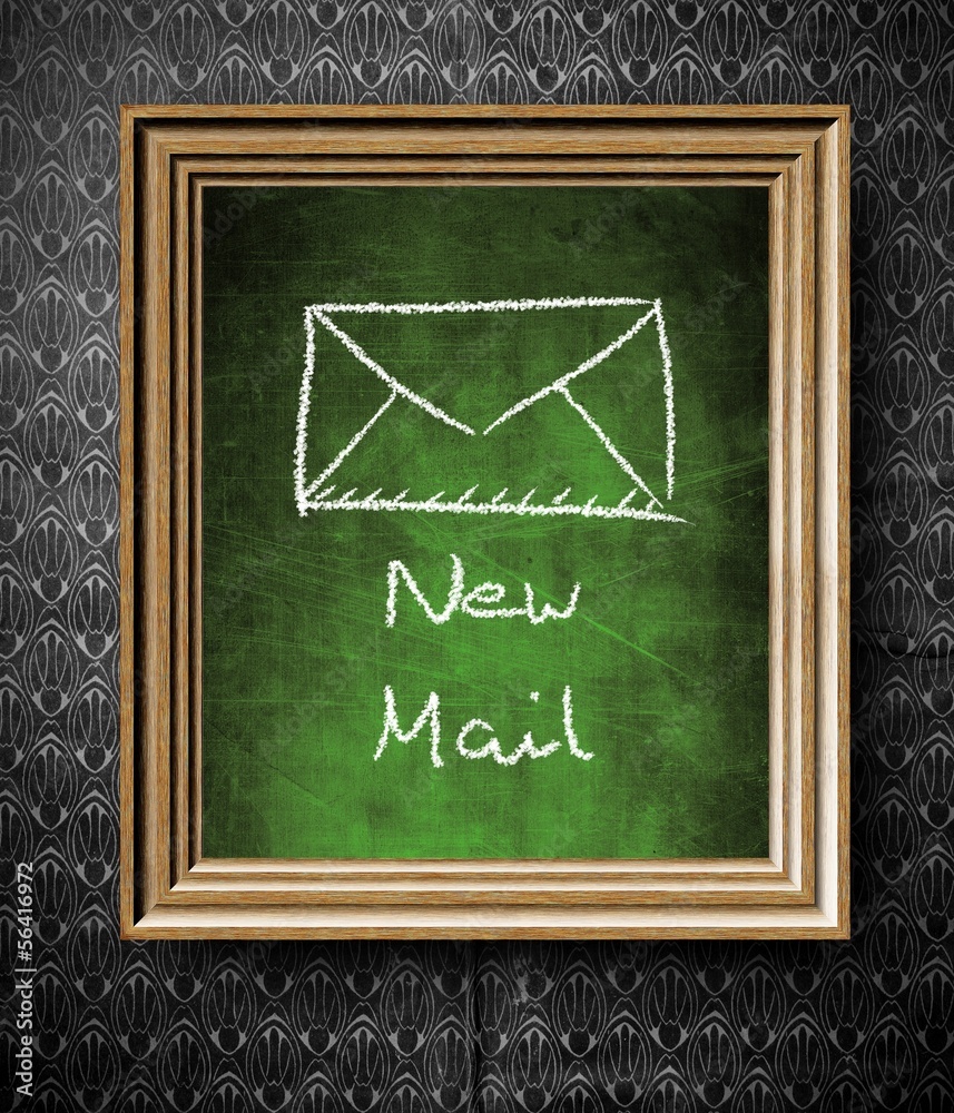 New E-mail symbol chalkboard in old wooden frame
