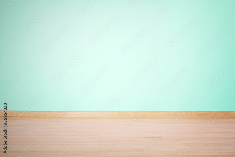 蓝绿色背景、空白墙和地板