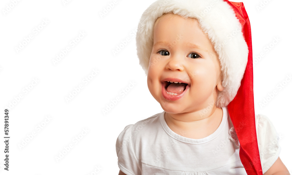 戴着圣诞帽的美丽快乐有趣的婴儿被隔离了