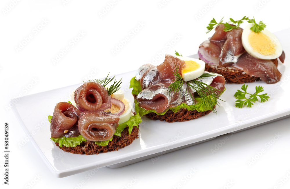 canapes with anchovies and egg