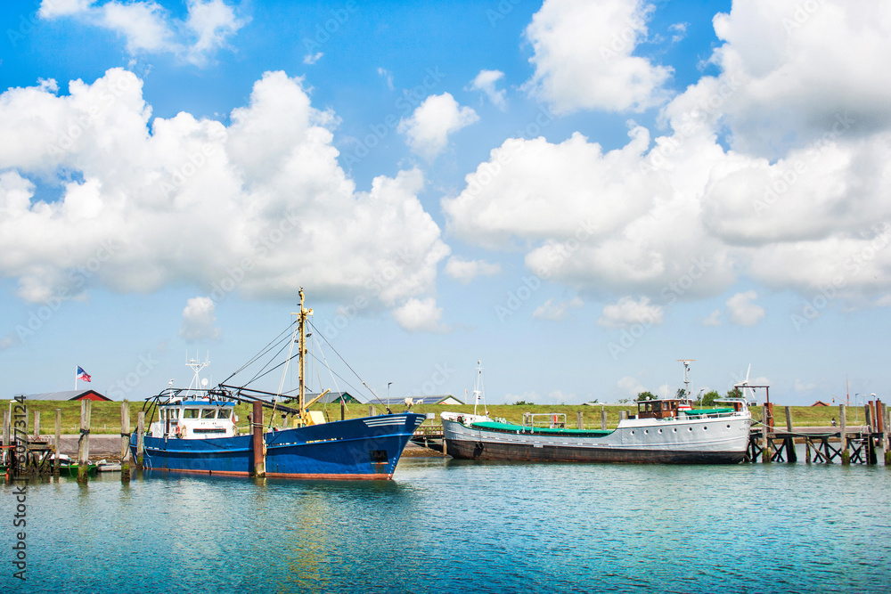 Old fishing boats at North Sea in Schleswig-Holstein, Germany