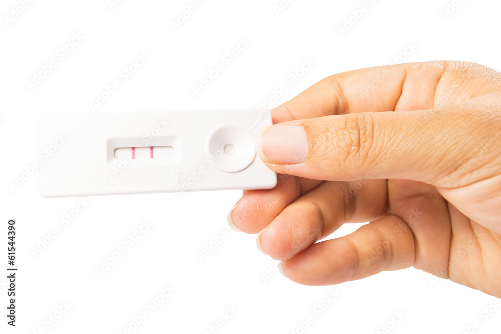 白色隔离的手部妊娠测试