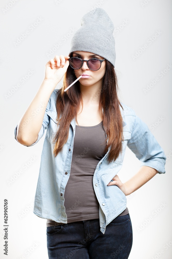 Stylish hipster teenage girl with cigarette