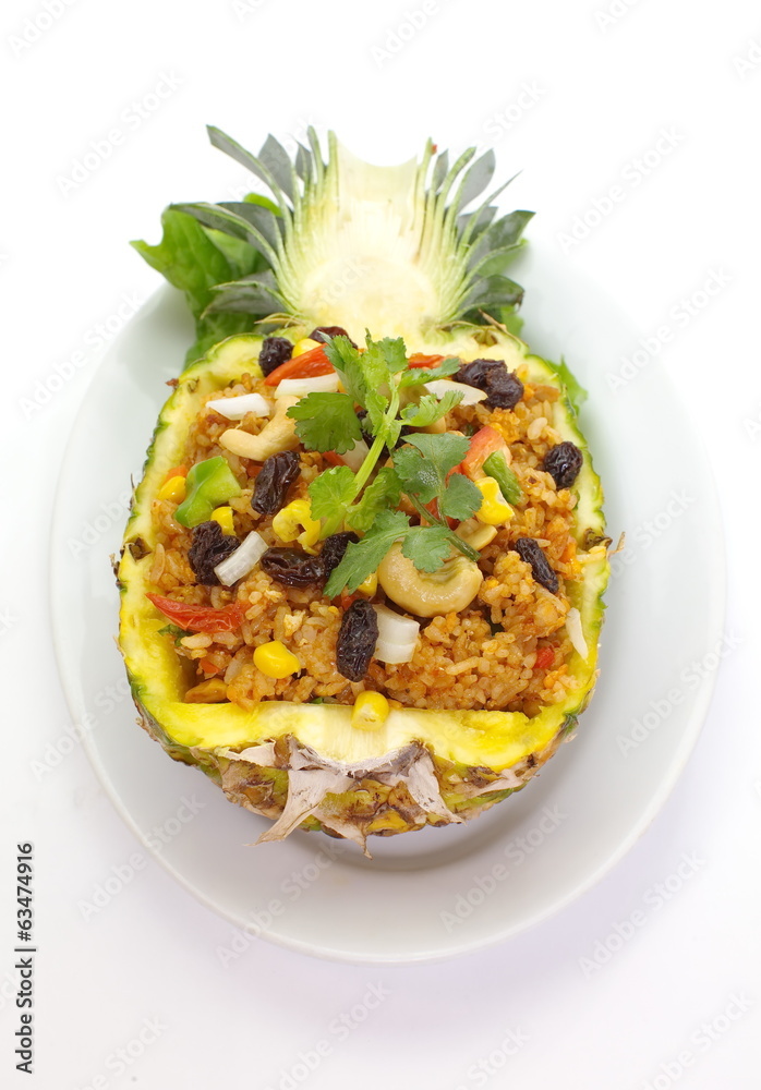 baked rice pineapple and vegetables  served in pineapple