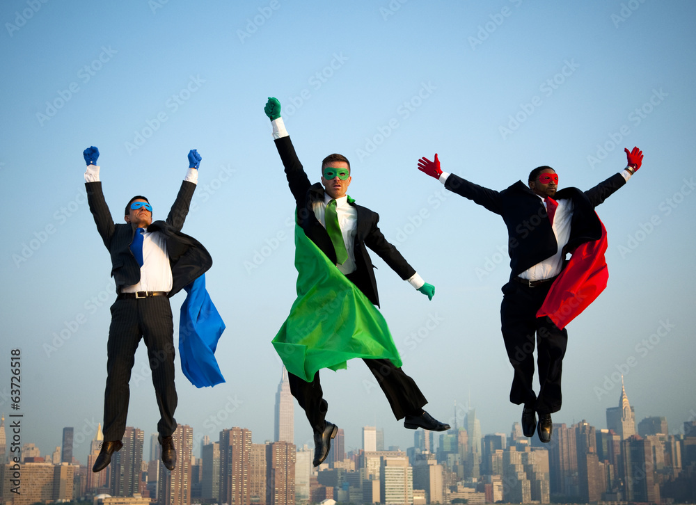 Multi-ethnic Superhero Businessmen Jumping