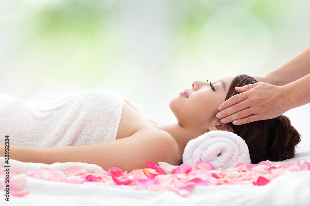 beautiful woman receiving massage