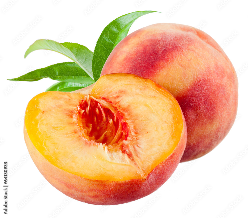 Peach and a half with leaves isolated on white