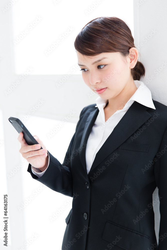 asian businesswoman using smart phone