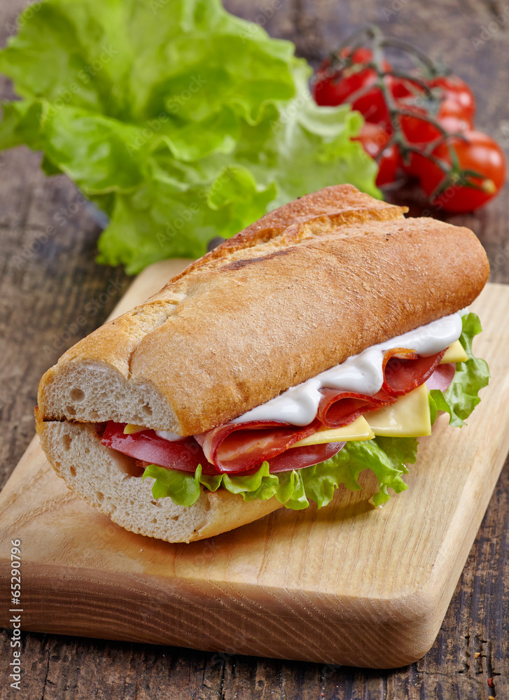 Sandwich with serrano ham and vegetables