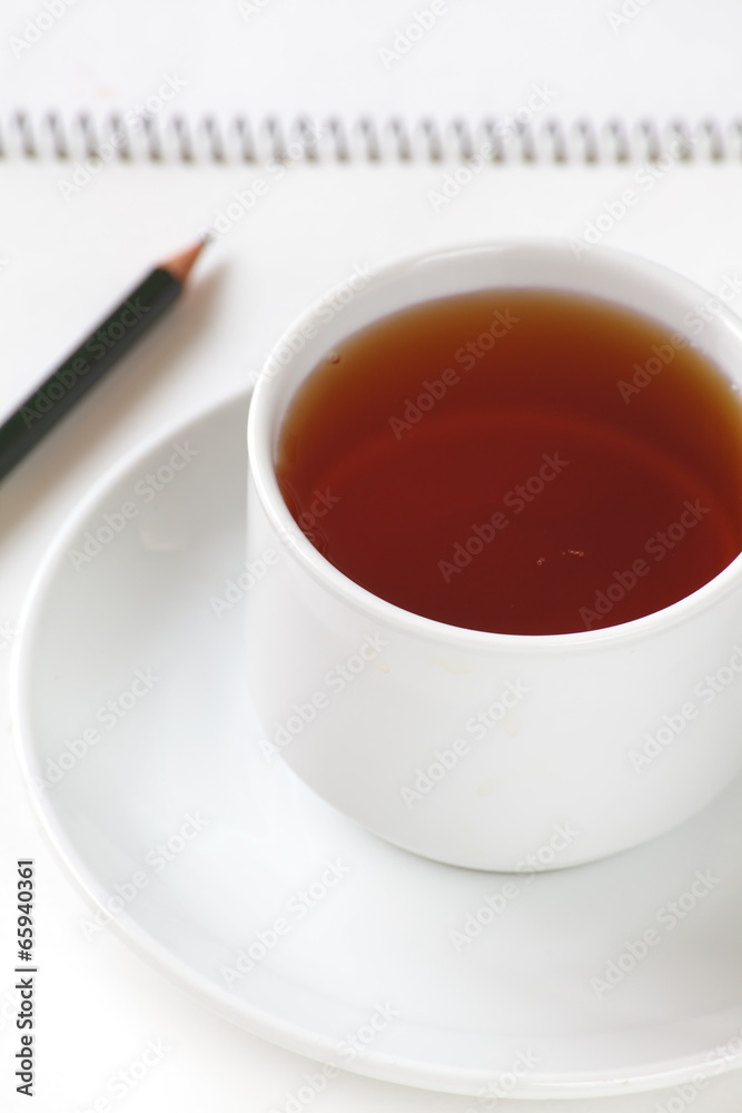 Healthy drink Chinese tea with note book and pencil