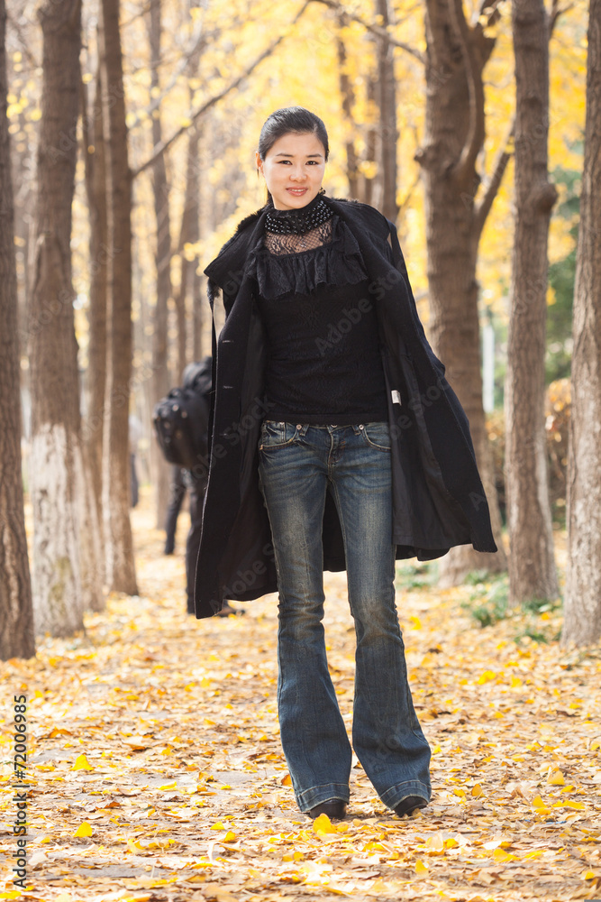 chinese young woman enjoy outdoor walk