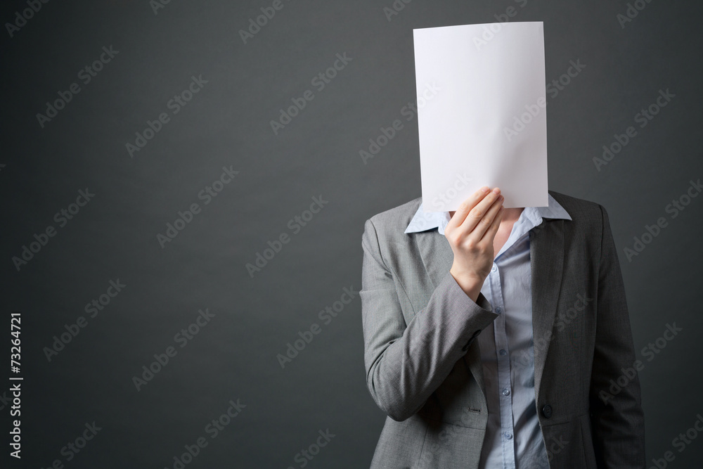 Blank Sheet of Paper Before Businesswoman