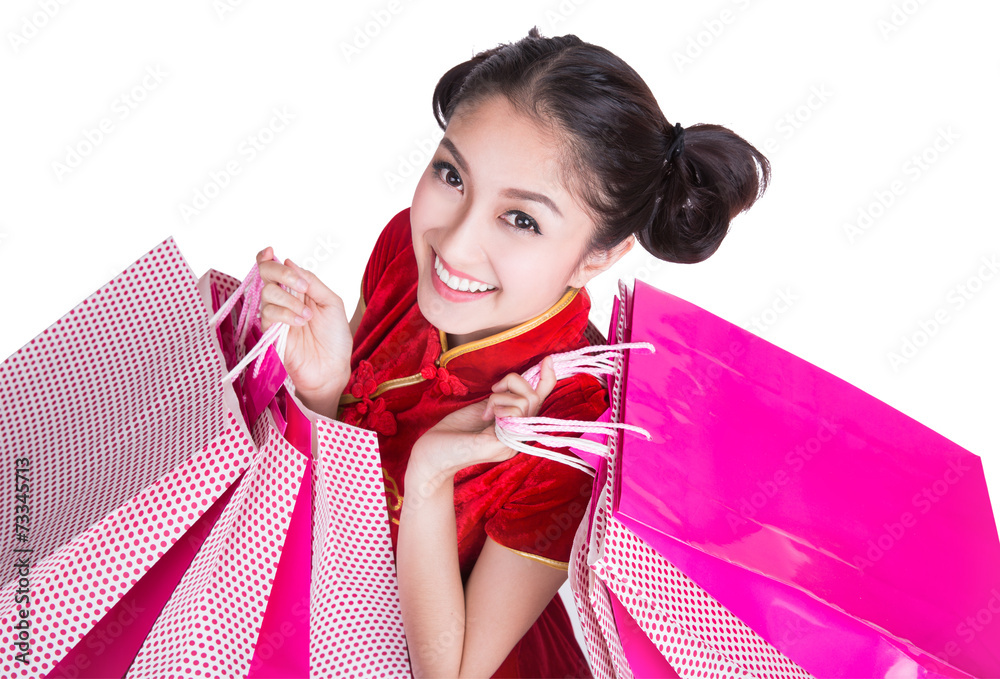 美丽的亚洲女孩快乐的微笑和购物