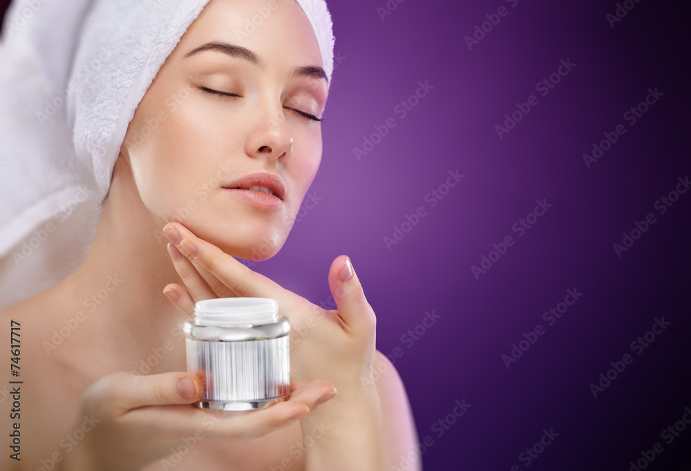 applying cosmetic cream